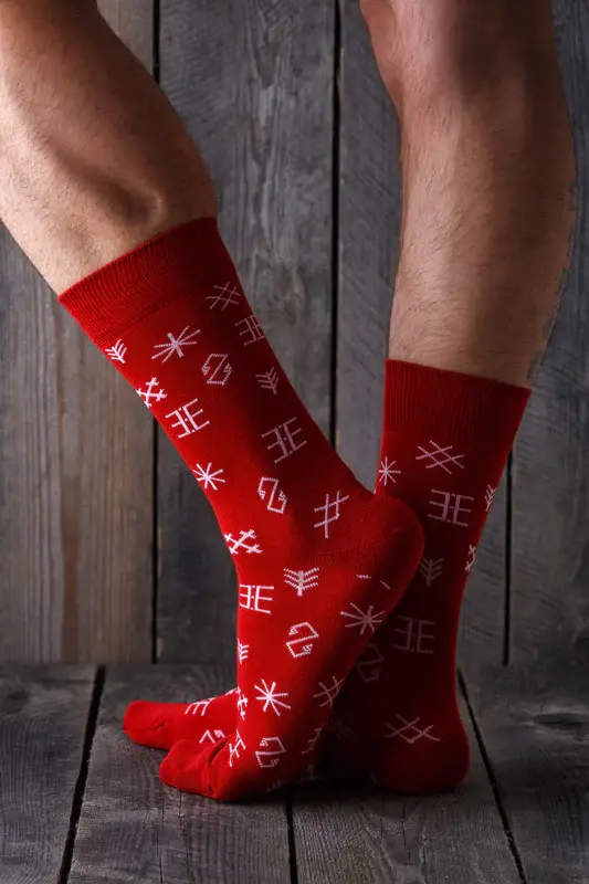 Thumbnail: Celebrate Baltic heritage with the Latvian patterned Nordic socks in red at Nord Haus