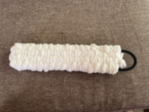 Woven slapper (fluffy) white yarn soft texture slapper.