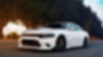 White Dodge Charger parked outdoors