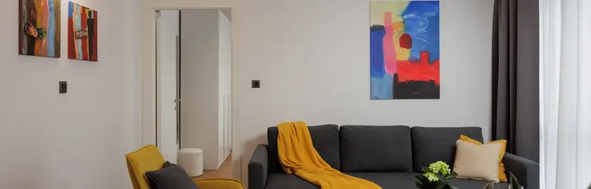 Living room from another angle showing dining area in Terra 5 Deluxe apartment, Rijeka