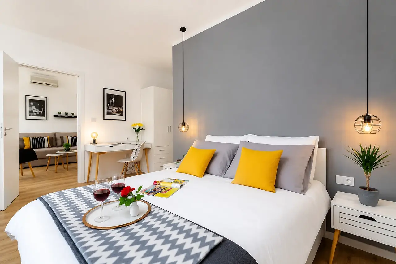 Modern boutique apartment interior with double bed and stylish minimalist design in Rijeka Croatia