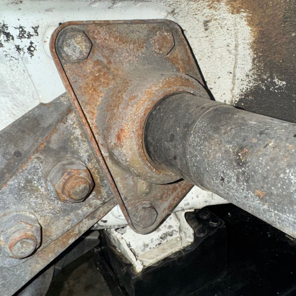 You can see that the cover is almost resting on the torsion bar cover.  The bushing is not in good shape. 