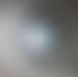 Ceiling light fixture that is on.