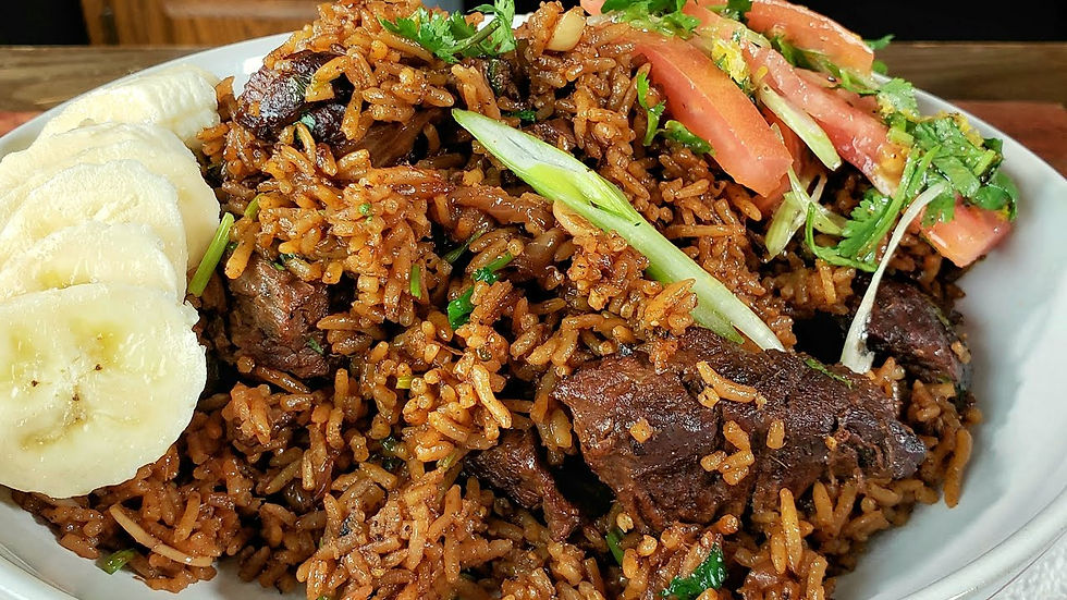 A plate of pilau, a delicious dish consisting of rice and meat, served as a flavorful and satisfying meal.