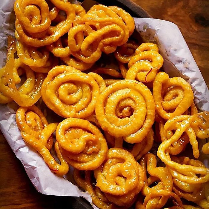 Sweet and crispy spirals of deep-fried batter, a popular Indian dessert.