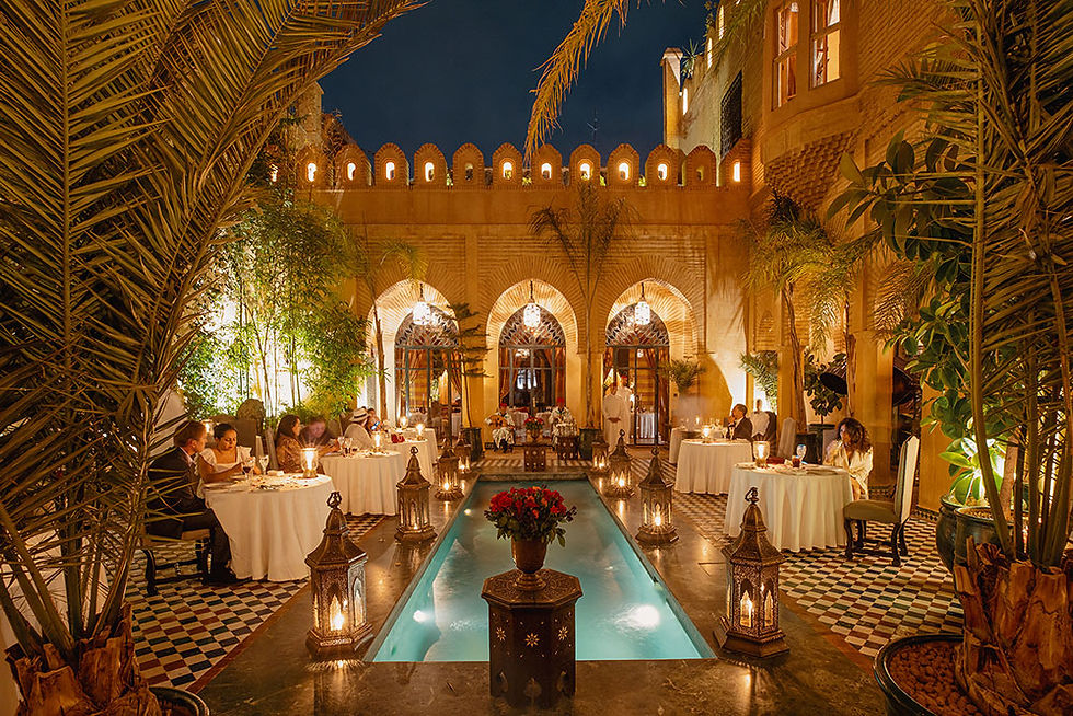a beautiful night time lit courtyard at restaurant Dar El Yacout