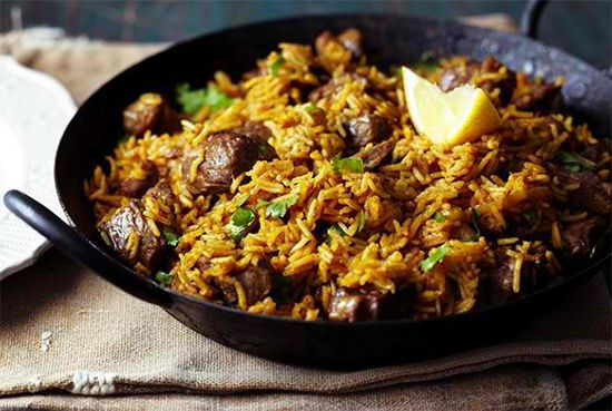 A plate of delicious Kenyan pilau, known for its rich flavors and aromatic spices. A culinary masterpiece.