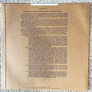 A vintage-style typed page reproduced on the Shellac At Action Park jacket, headed 'Appendix C: Resuscitation from Apparent Death by Electric Shock,' with dense paragraphs of old first-aid instructions.