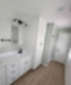 White Tall Linen Cabinet with matching vanity cabinet