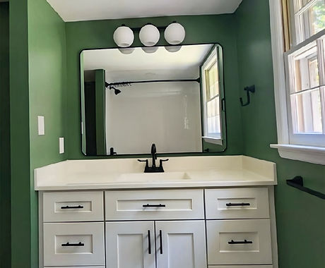 White shaker vanity with white counterto