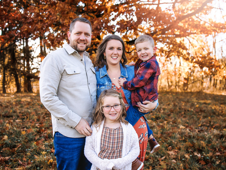 Parents and children at a luxury family fall photography session at Knox Farms in East Aurora, NY near Buffalo, NY