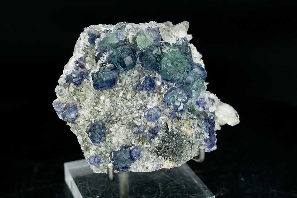 Thumbnail: Purple and Green Fluorite & UV-Reactive Calcite on Crystal Quartz Fujian