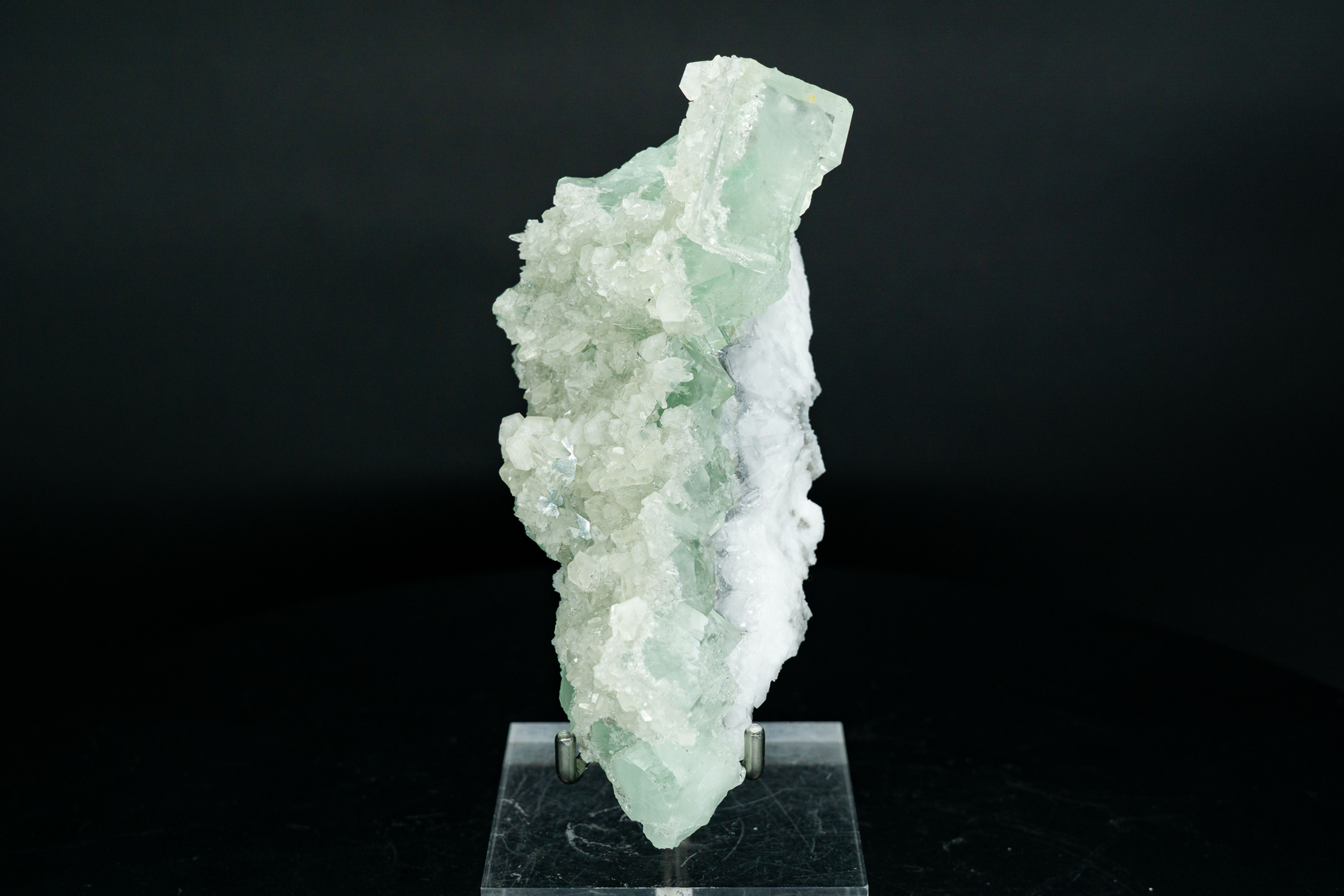 UV-Reactive Green Fluorite & Calcite on Crystal Quartz w/ Acrylic Stand Zhejiang