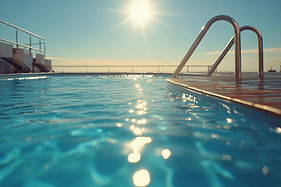vecteezy_a-bright-sunny-day-at-a-rooftop-pool-with-clear-water-and-a_51703906.jpeg