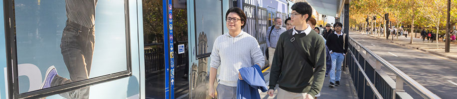 two-students-walking-down-the-street.jpg