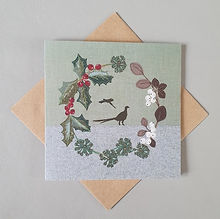 Pheasants in festive wreath Christmas card