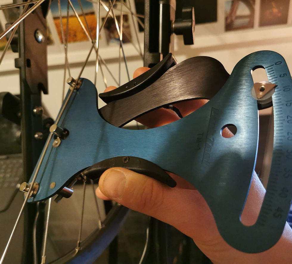 Get that tension even between spokes connected to the same flange