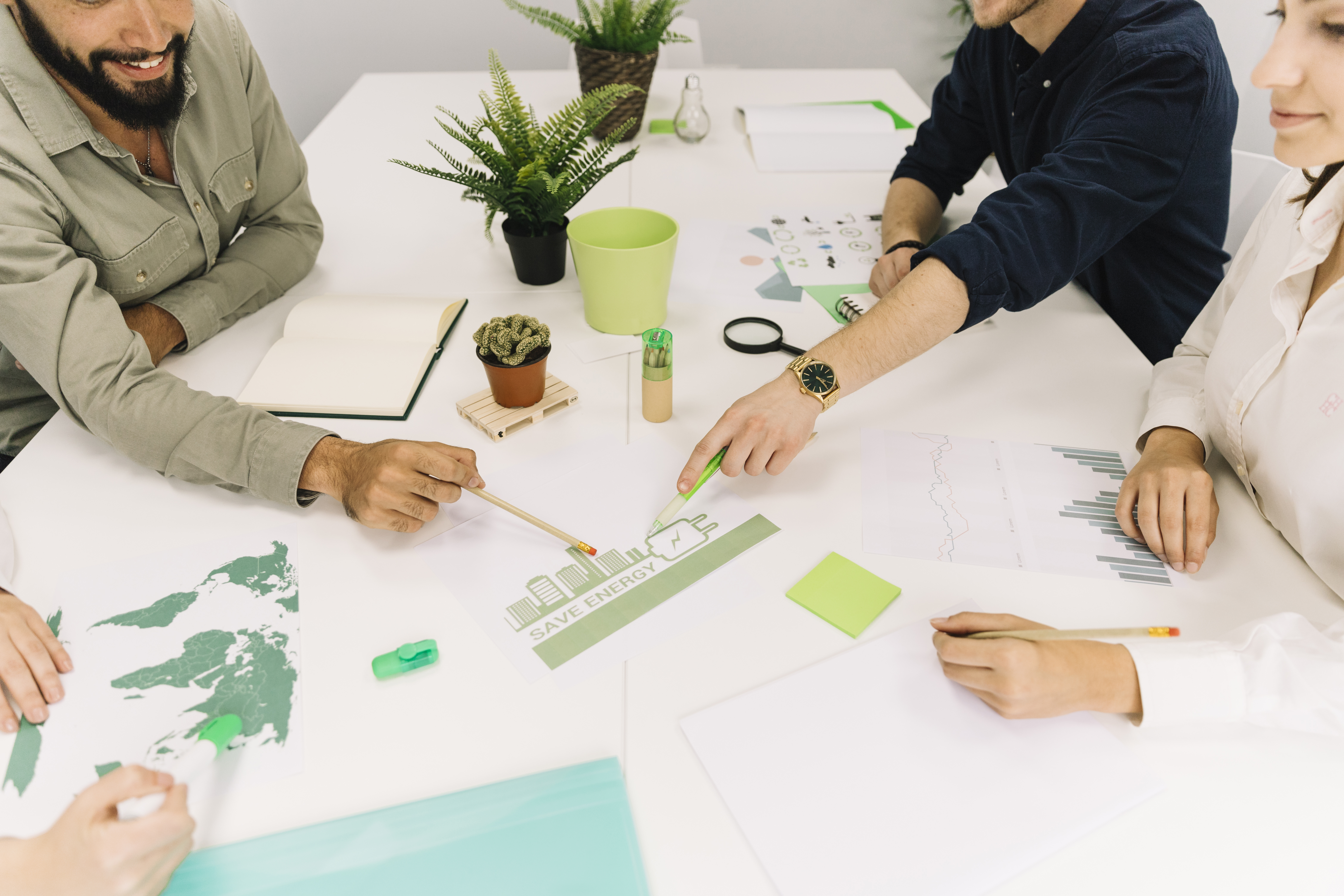 group-businesspeople-making-plans-energy-saving-workplace.jpg
