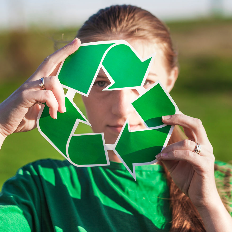 recycle-background-with-woman-holding-recycle-sign.jpg