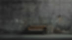 Chesterfield Sofa und Betonwand