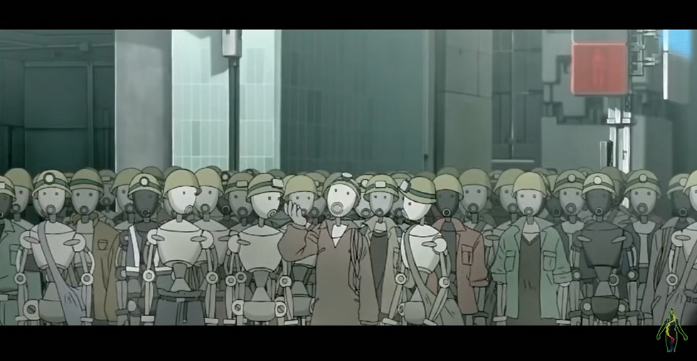 Una escena inicial de la película The Animatrix (2003) en donde se muestra el papel de los robots .