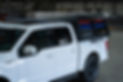 Tactic Designs metal fabricated truck box. Cargo doors open to showcase various tools for trades. Made in Canada.