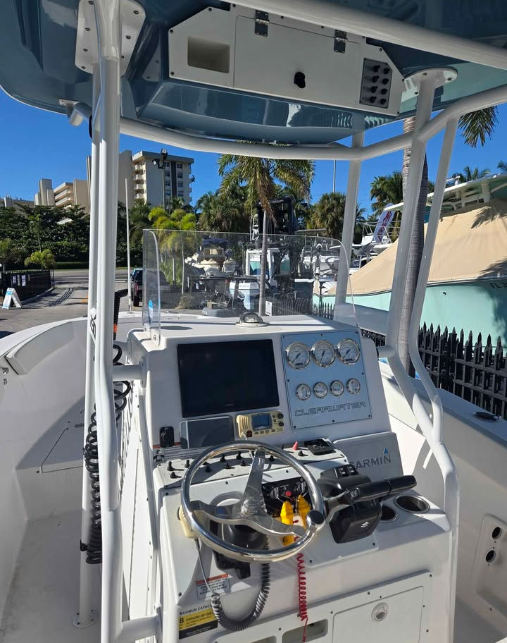 Consignment Clearwater 23’ Center Console used boat, excellent shape, twin Suzuki 150 power, painted hardtop with audio syste