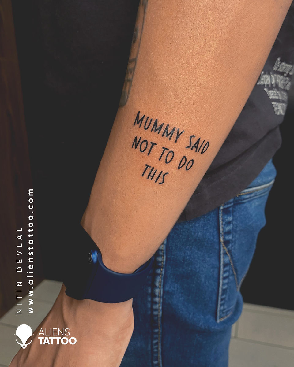 Quote Tattoo on side arm at Aliens Tattoos