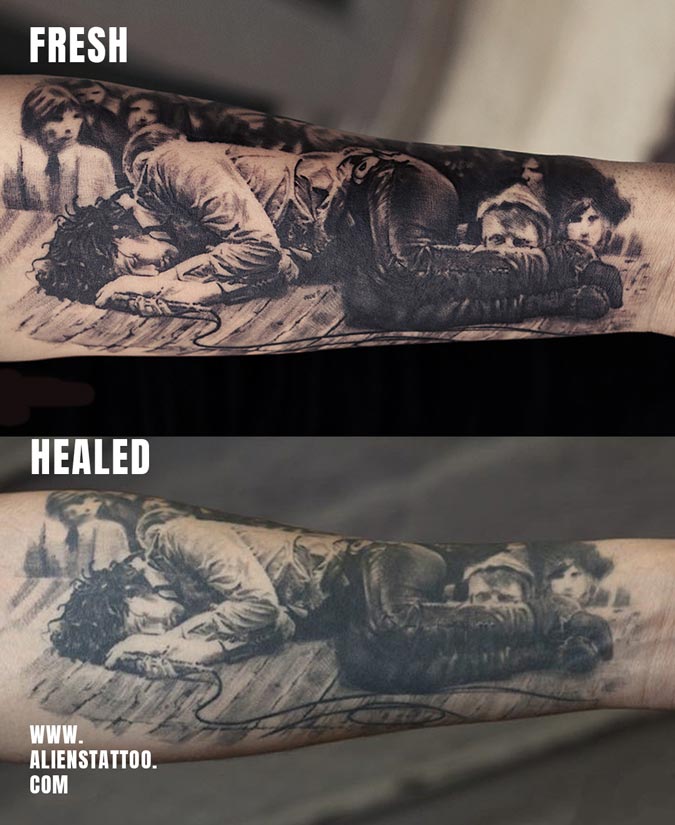 black and gray portrait tattoo