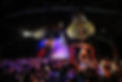 Aerialist Bartender: "Aerialist bartender pouring champagne from a chandelier at NYE on the Lake