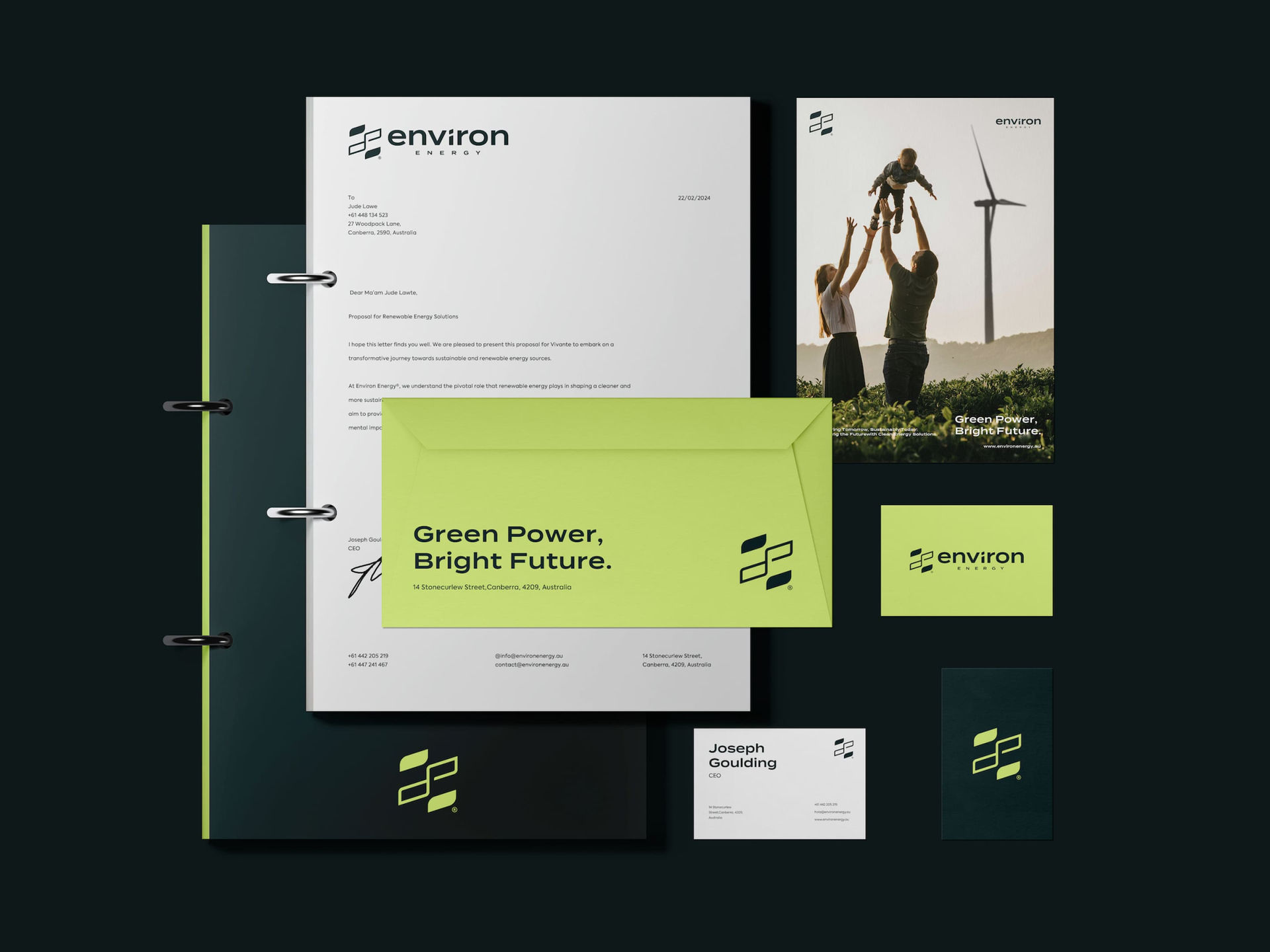 Branding mockup for 'Environ Energy' with letterhead, green envelope, business cards, brochure with family and wind turbine, conveying innovation and sustainability.