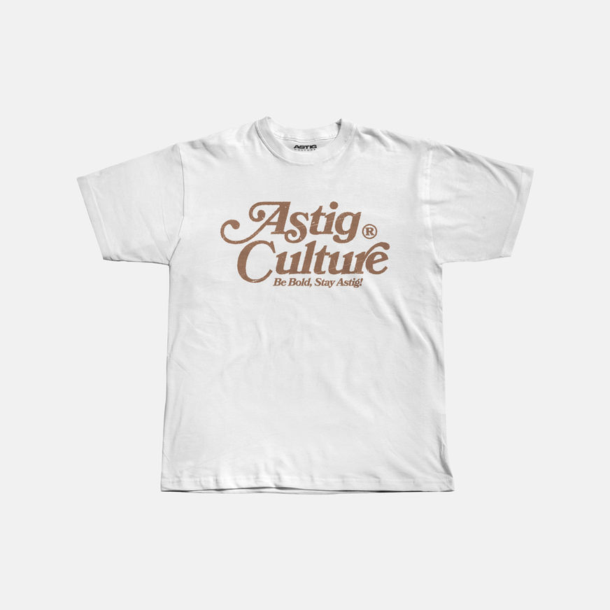 White T-shirt with bold brown text "Astig Culture" in a stylized font. Below, smaller text reads "Be Bold, Stay Astig!"