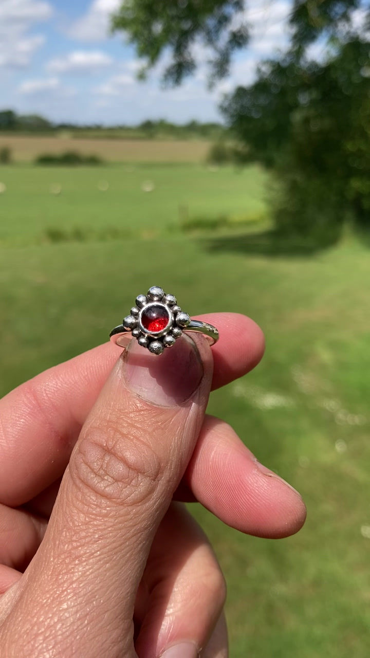 Thumbnail: Eco sterling silver garnet ring with a ball boulder simple setting