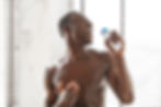 naked-african-man-singing-holding-shampoo-bottle-t-2026-01-09-06-55-51-utc.jpg