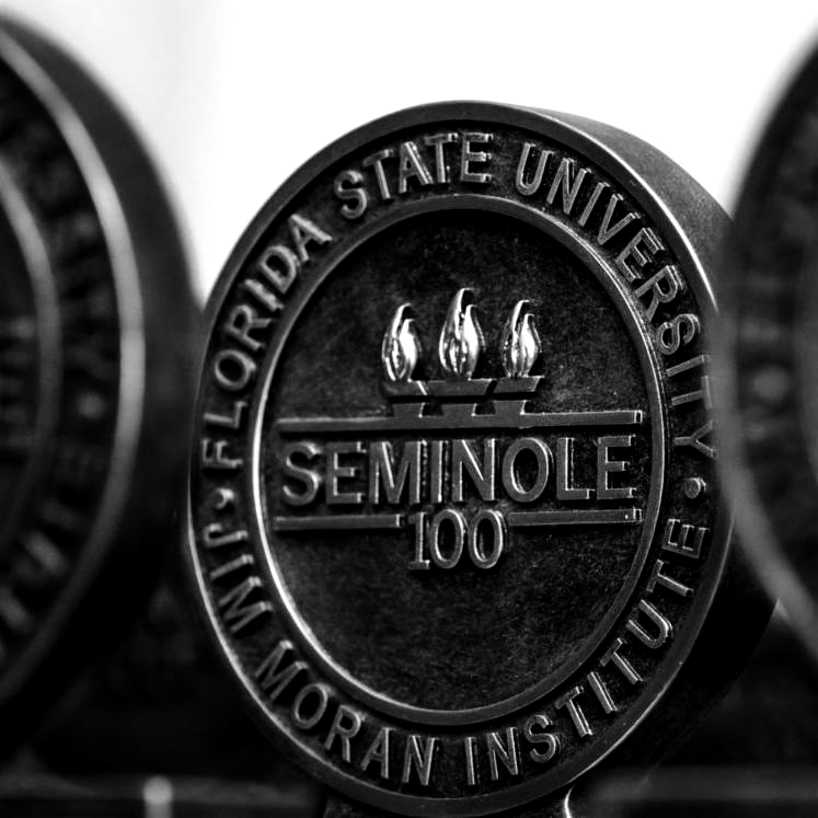 Seminole 100 award logo recognizing The Aleksander Group as one of the fastest-growing businesses led by Florida State University alumni, presented by Florida State University the Jim Moran Institute for Global Entrepreneurship.