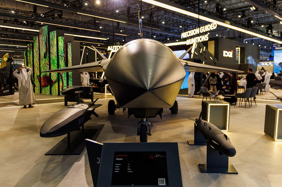 EDGE Group JENIAH stealth unmanned combat aerial vehicle displayed with precision guided munitions at Dubai Airshow