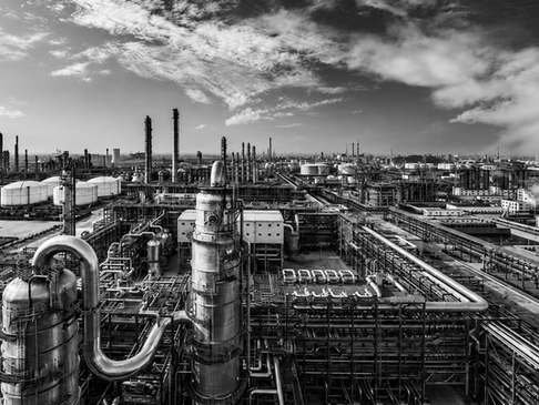 Black-and-white view of industrial energy infrastructure illustrating the capital requirements and fraud risks surrounding hydrogen projects in Florida