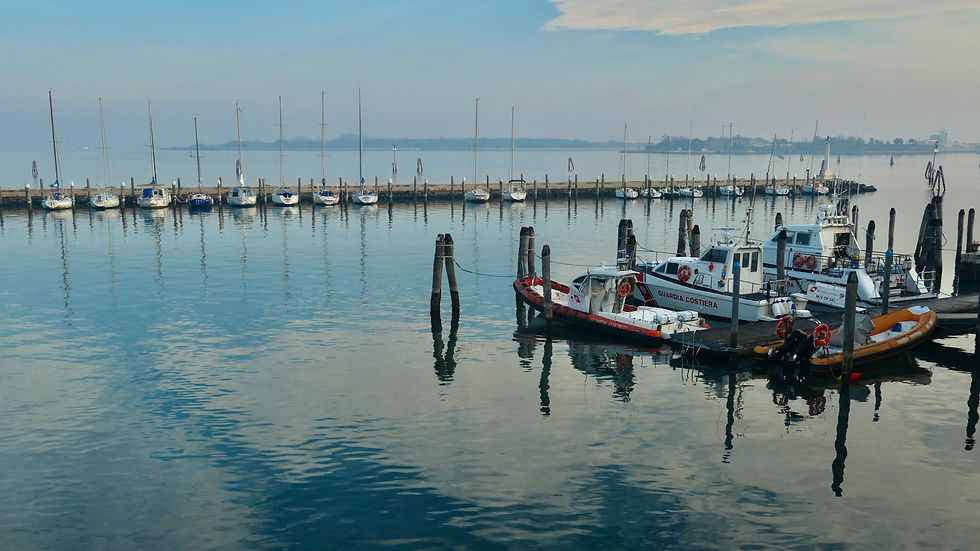 The view from Piazza Vigo towards the lagoon barrier islands of Ca' Roman and Pellestrina