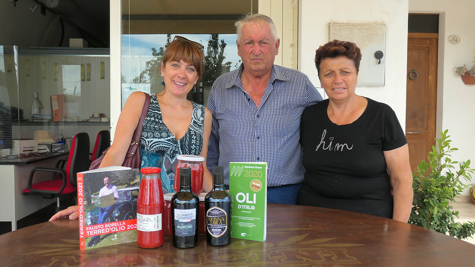Alessandro Mancini, his wife and their olive oil