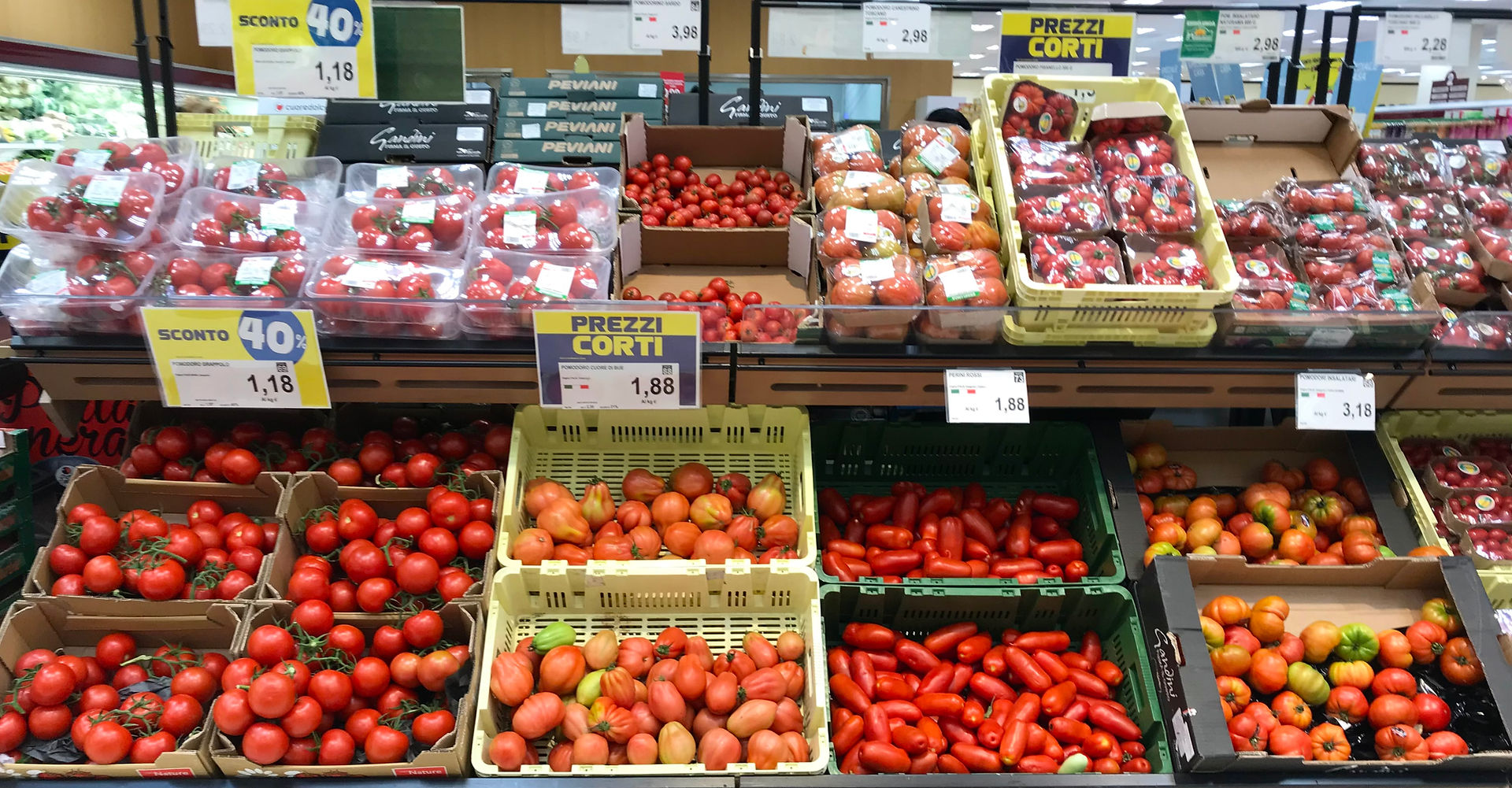 shelves of tomatoes in an Italian supermarket
