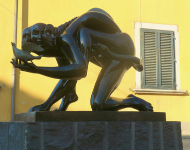 Pietrasanta outdoor sculpture crouching figure