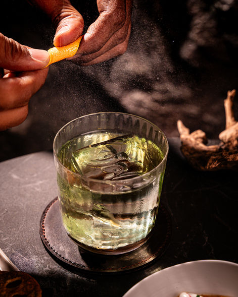 Refined bar cuisine at KOJAK Juhu served alongside signature cocktails in an intimate setting