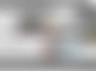 Photograph of a computer monitor, a tablet, and a mobile phone all displaying the front page of the Wall Street Journal