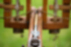 Closeup of a large catapult sitting on the grass