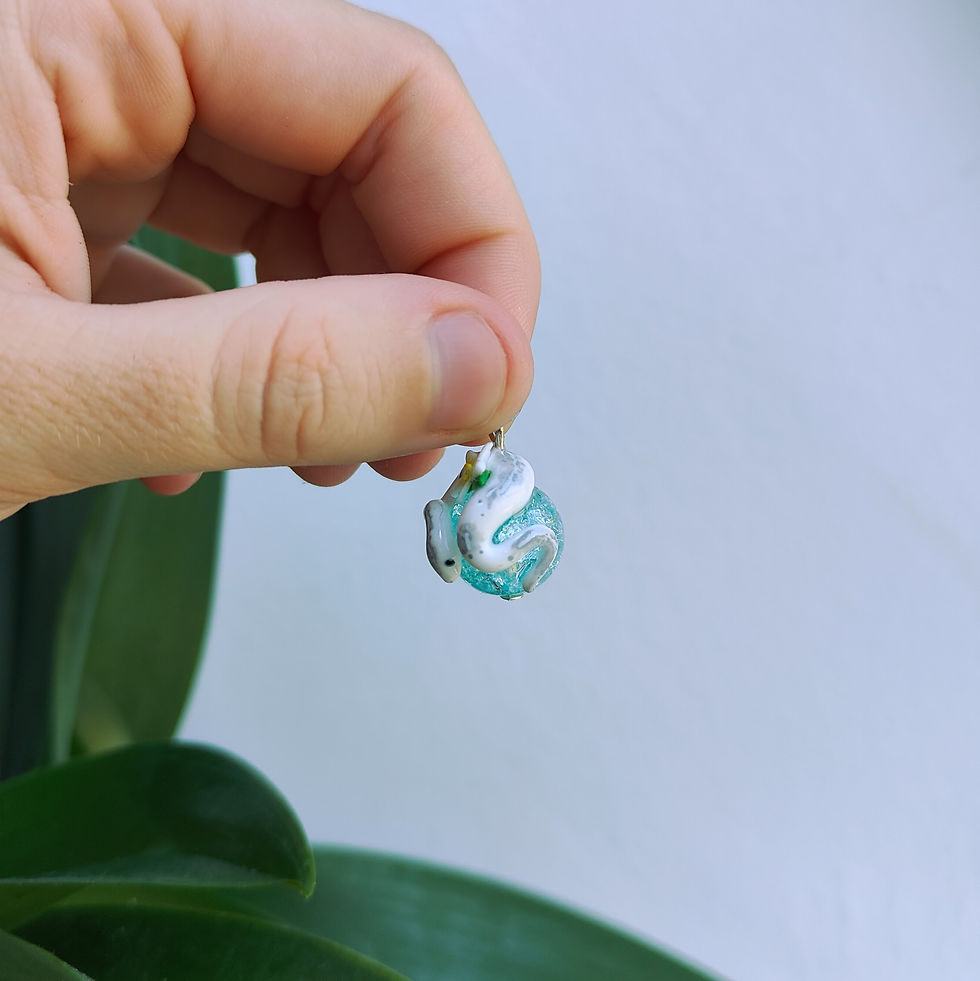 Thumbnail: small albino python / pendant