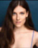 retouched blue headshot.jpeg