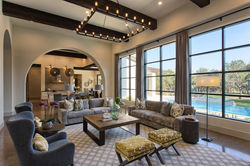 Interior living area with contemporary furnishings and abundant natural light.