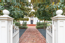 Approach view of Woodbine Mansion historic venue showing entry sequence and arrival experience