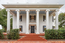 Front exterior view of Woodbine Mansion historic estate event venue with restored architectural deta