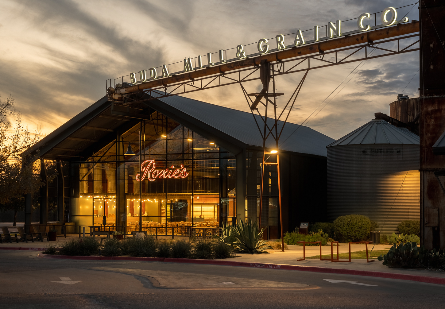 Sunset exterior of Roxie's restaurant at the Buda Mill and Grain